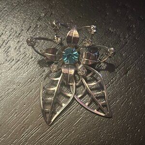 VTG Silvertone Open Work Floral Brooch or Pendant with Blue & White Rhinestones